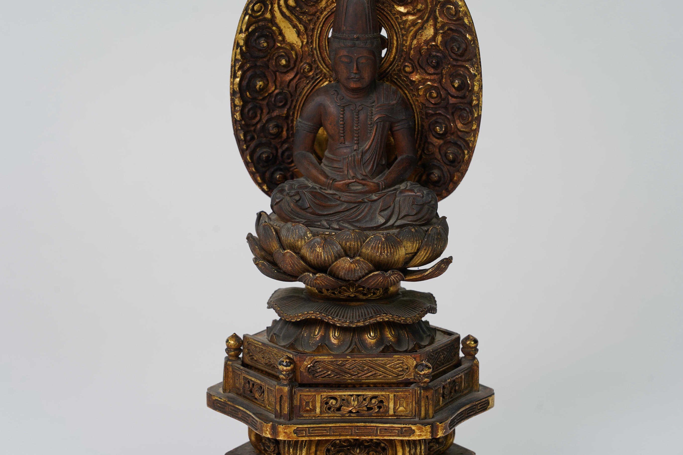 A Japanese Buddhist boxwood and giltwood seated figure of Dainichi Nyorai, 19th century